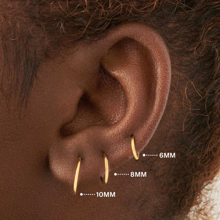This is an image of a gold clicker with a 10mm inner diameter. color:null|gold