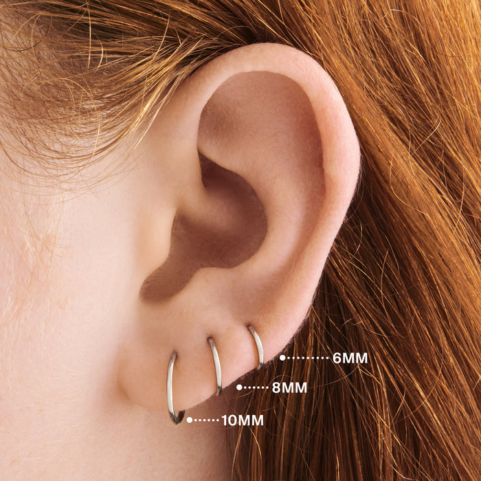 This is an image of a silver clicker with a 10mm inner diameter. color:null|silver