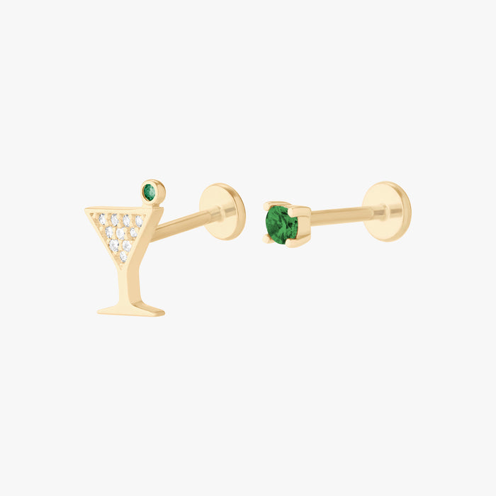 This Image shows a set of 14k Yellow Gold earrings. The set contains a Gold pave martini stud and a Gold green cz stud flatback.