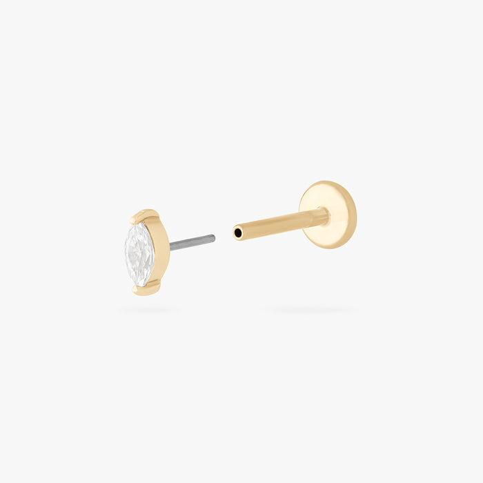 This is an image of a 14k gold flatback with a marquise setting and clear stone. color:null|14k gold/clear