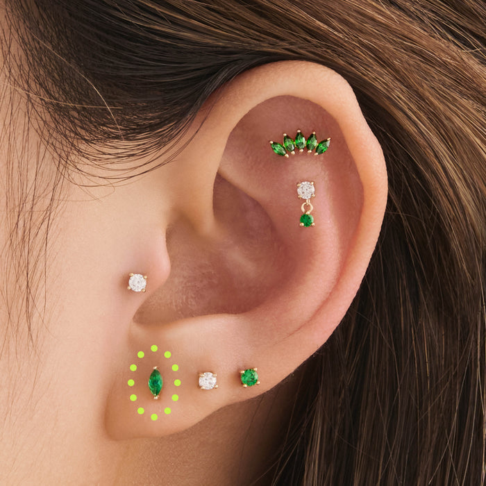 This is an image of a 14k gold flatback with a marquise setting and green stone. [hover] color:null|14k gold/green