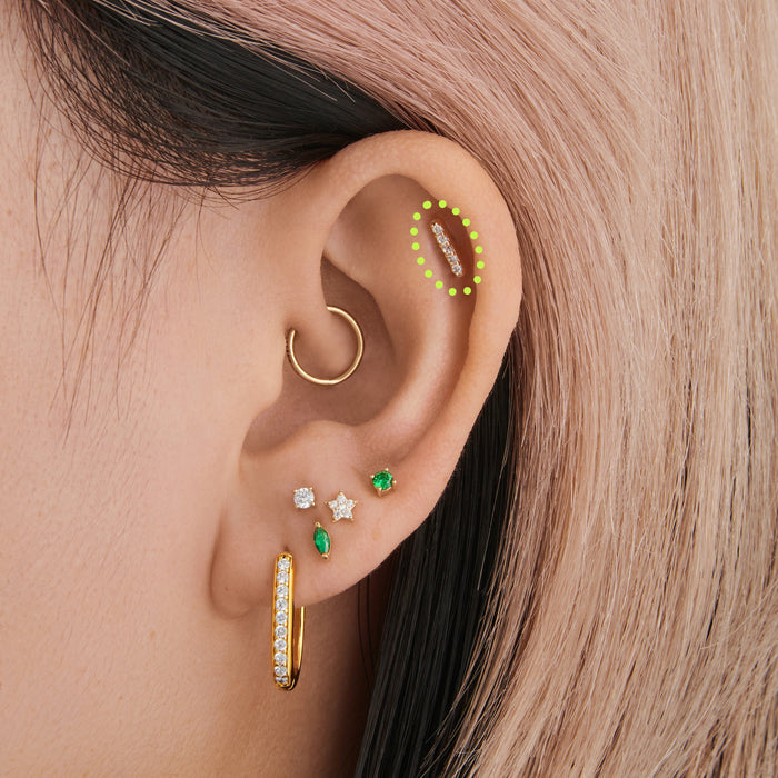 This images shows an Earscape with the 14k Yellow gold pave flatback with five CZ stones