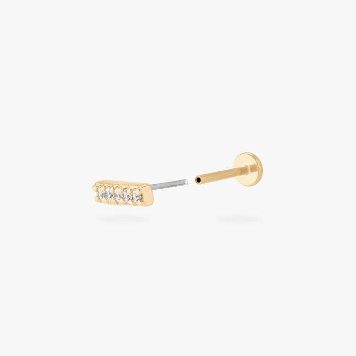 This image shows the front of the 14k pave bar Flatback separated from the labret