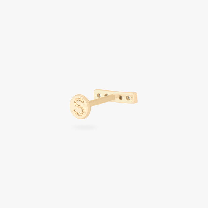 This image shows the back of the 14k pave bar Flatback connected to the labret