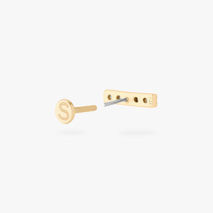 This image shows the back of the 14k pave bar Flatback separated from the labret