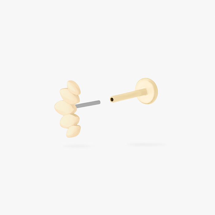 This is an image of a 14k gold flatback stud that is a solid gold crown marquise shape.