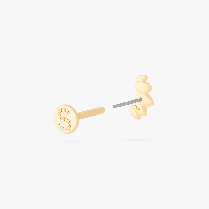 This is an image of a 14k gold flatback stud that is a solid gold crown marquise shape.