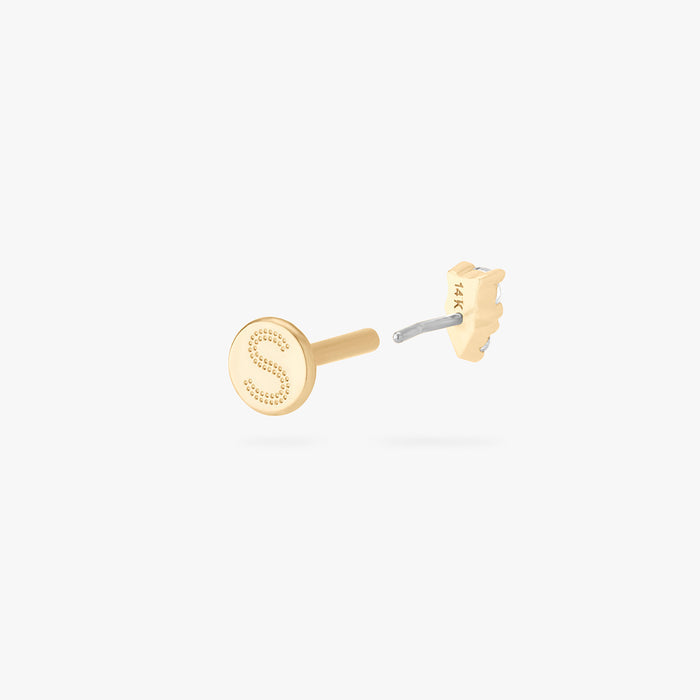 This is an image of a gold flatback stud with a clear stacked cz stone.