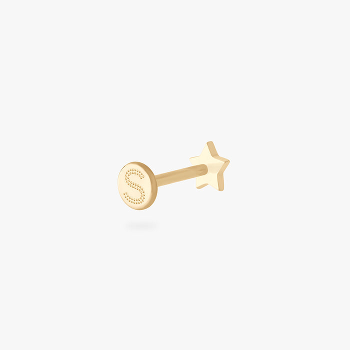 This is an image of a 14K gold flatback stud that is in the shape of a star.