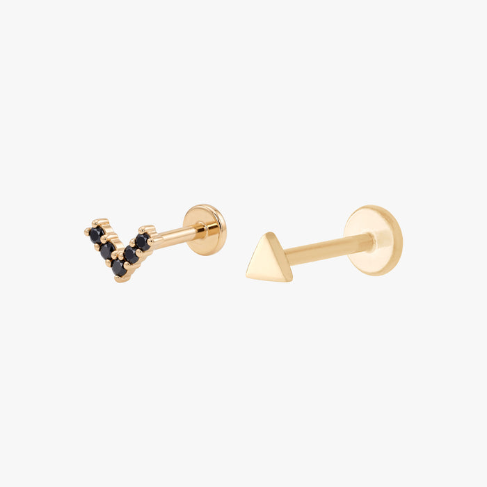 This image shows a 14k Yellow Gold stud set. The set includes a Gold V flatback stud with black cz stones and a Gold triangle flatback stud.