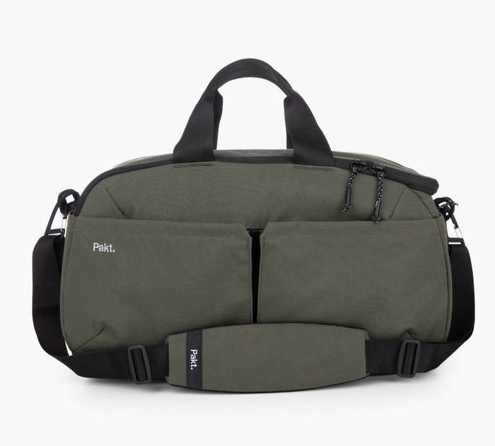 Olive-green duffel bag with top handles, detachable shoulder strap and Pakt. logo on front