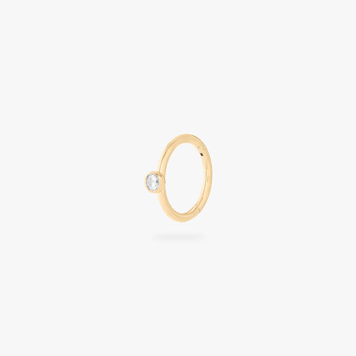 gold clicker with a cz bezel accent stone color:null|gold/clear