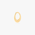 This is an image of a gold-toned titanium clicker that has an 8mm diameter and appears chunky at the bottom.