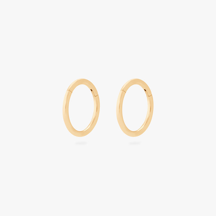 This is an image of a pair of gold clickers with 8mm inner diameters. [pair] color:null|gold