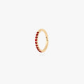 This is a gold toned clicker with garnet cz stones. color:null|garnet