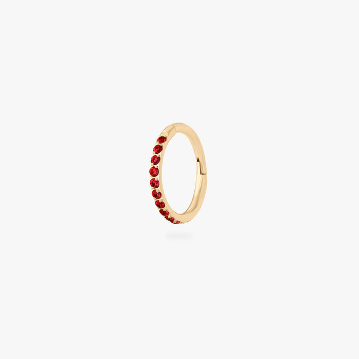 This is a gold toned clicker with garnet cz stones. color:null|garnet