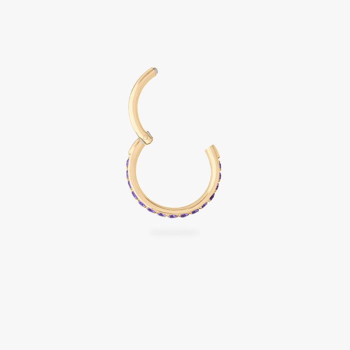 This is a gold toned clicker with amethyst cz stones. color:null|amethyst