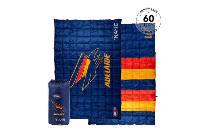 Adelaide Crows navy quilted puffy blanket with red and gold stripes, shown unfolded and with matching carry bag, featuring AF