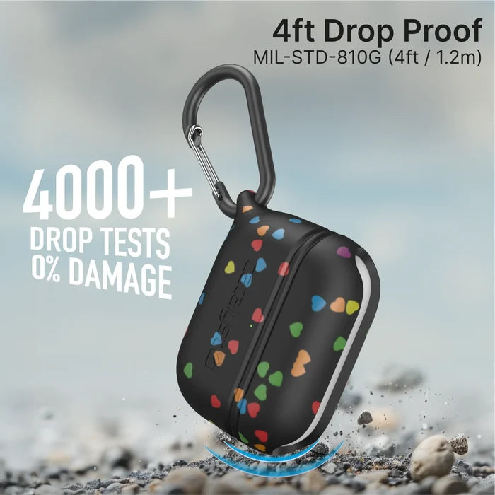 A black Catalyst Case US AirPods Pro (Gen 3/2/1) waterproof case with colorful heart patterns is shown with a carabiner. Text highlights “4ft Drop Proof MIL-STD-810G” and “4000+ Drop Tests 0% Damage” as the case drops on a grey background.