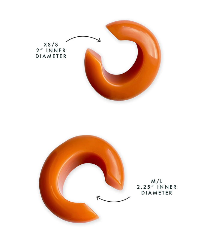 Diagram showing size difference between XS/S and M/L Arc Cuffs