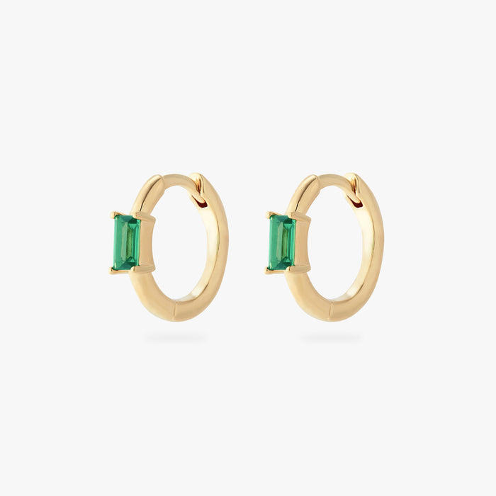 a pair of gold small slim huggies with green CZs [pair] color:null|gold/green