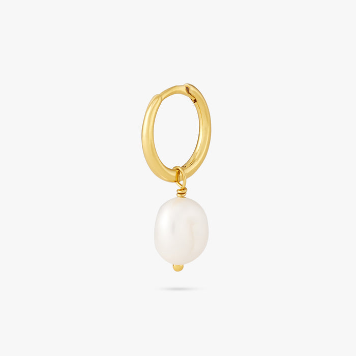 This is a dangling pearl huggie. color:null|gold
