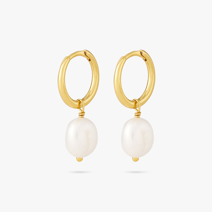 This is a dangling pearl huggie. [pair] color:null|gold