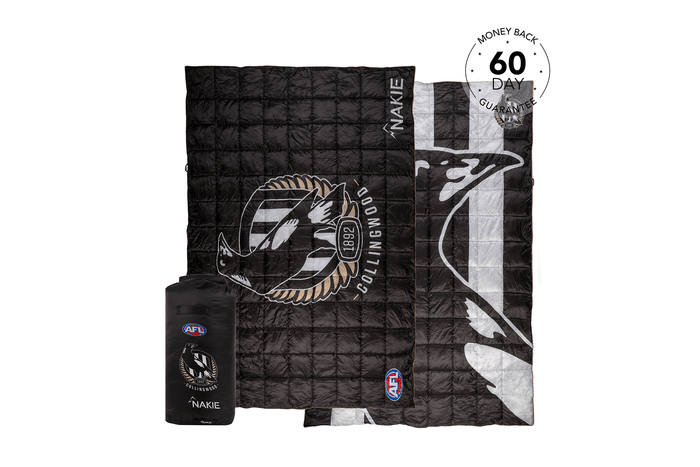 Black quilted puffy blanket with Collingwood Magpies AFL logo, white stripe detail, and storage pouch.