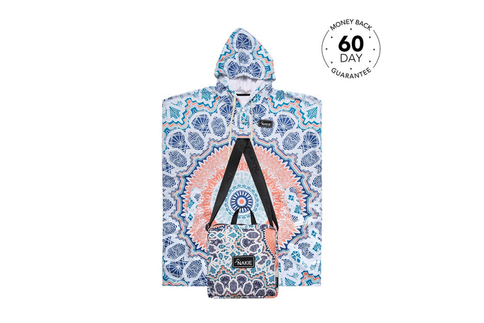 Hooded towel with geometric blue, coral, and white pattern, front view showing hood and black handles for carrying.