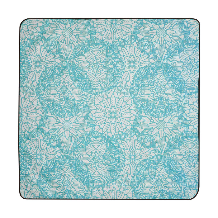 Studio shot of Nakie's picnic blanket in Floating Lotus color, featuring its serene and calming hue