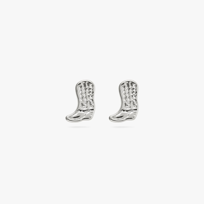 This is a small silver cowboy boot shaped stud with detailing [pair] color:null|silver