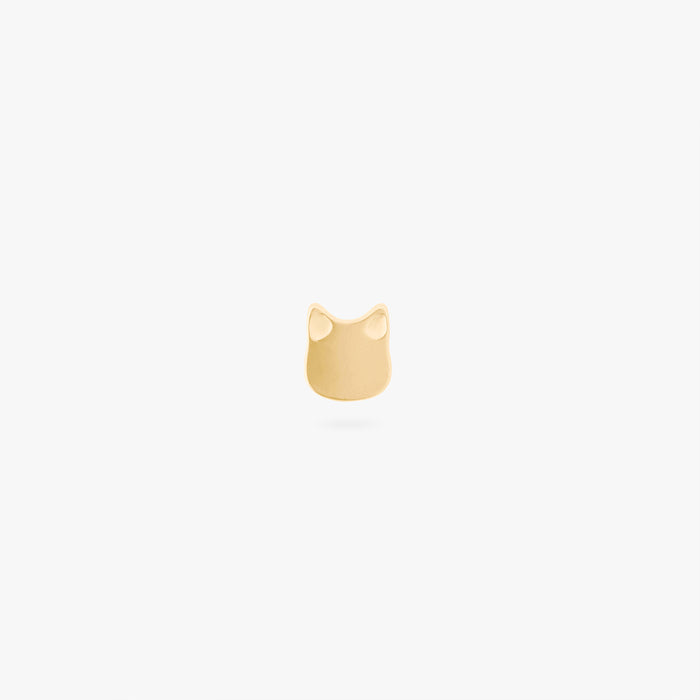 Gold cat-shaped earring on a white background