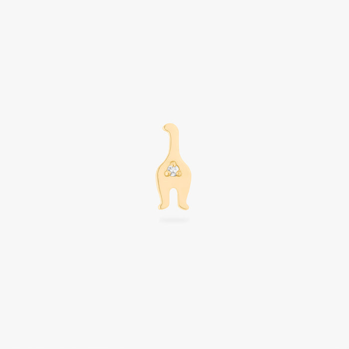 Back of gold cat earring with gemstone on white background
