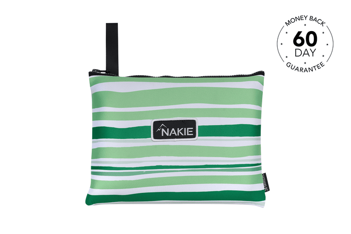 Green and white striped recycled sand-free beach towel with black carry strap and Nakie logo patch