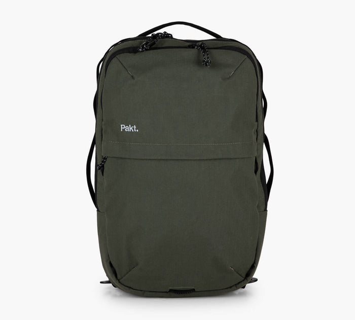 Front view of Everyday 15L bag showcasing zippered front pocket and top handle in Forest green on white background