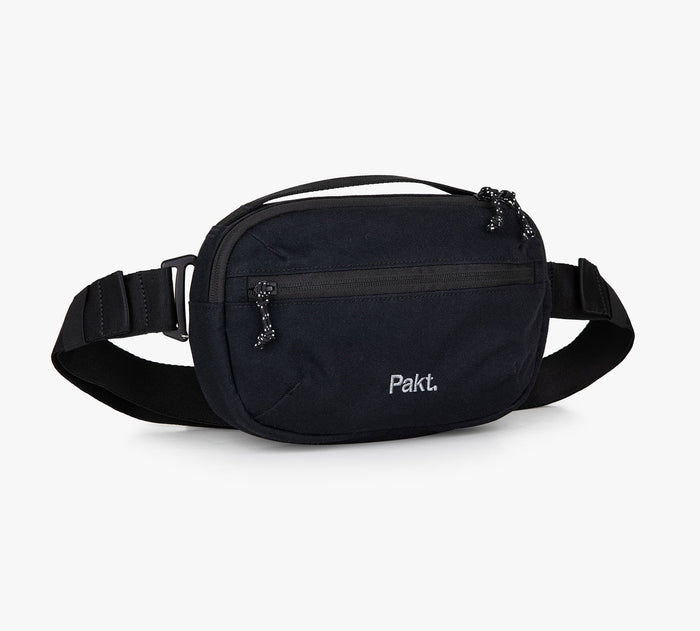 Black Pakt. Everyday 3L sling bag with zip front pocket and adjustable strap