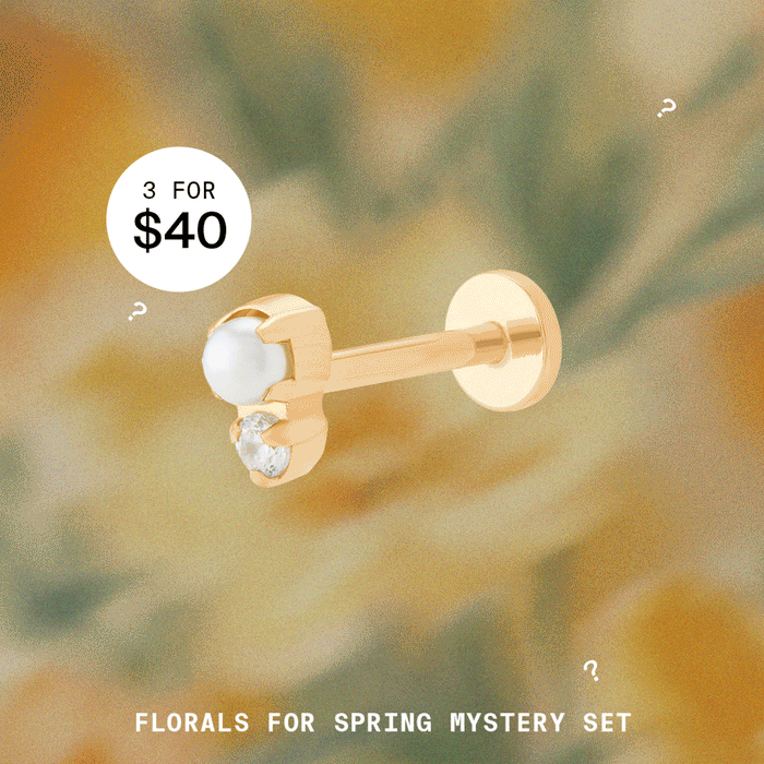Florals for Spring Mystery Set featuring 3 gold styles for $40. Image shows an assortment of gold earrings over a gradient background.