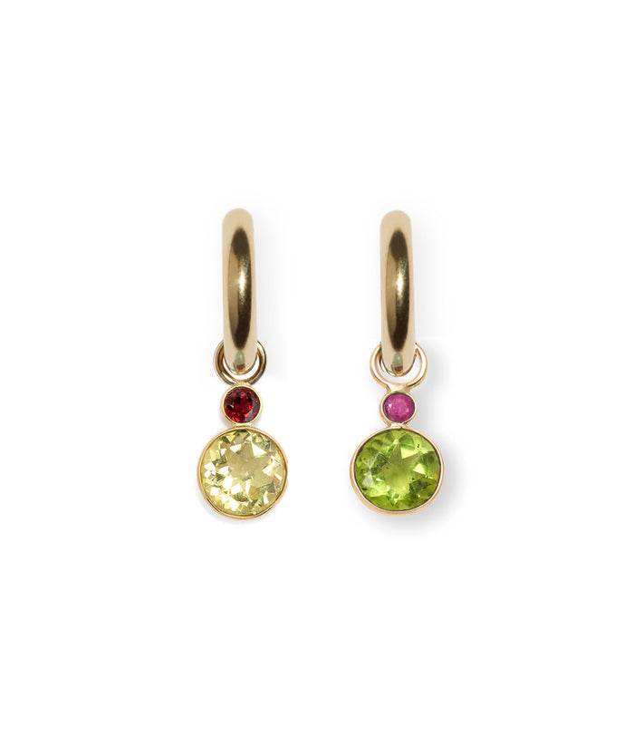 Pair of gold hoops with hanging mismatched semiprecious circle charms.
