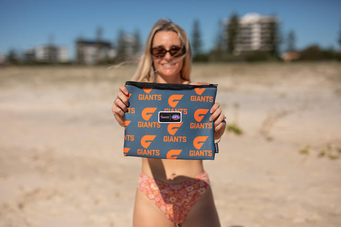 GWS Giants blue and orange zippered beach pouch with repeating logo pattern and sand-free design