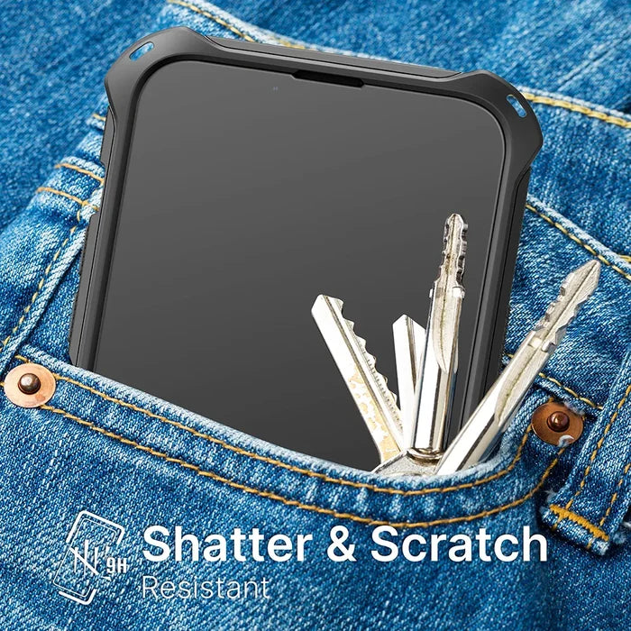 An iPhone 12 Pro/12 with a Catalyst Case US tempered glass screen protector, labeled “Shatter & Scratch Resistant” with a 9H shield icon, is shown in a rugged black case inside blue denim jeans pocket.