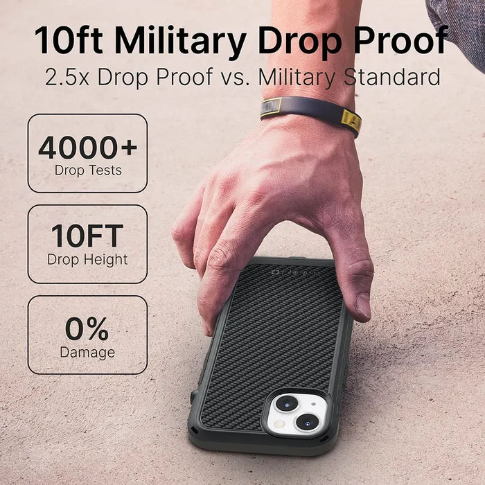 A hand lifts an iPhone 13 mini in a black Catalyst Case US Vibe Case (MagSafe Compatible) from the ground; text highlights: "10ft Military Drop Proof," "2.5x Drop Proof vs. Military Standard," "4000+ Drop Tests," and "0% Damage.
