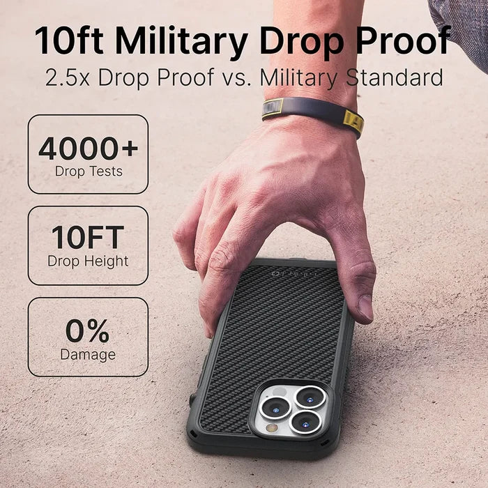 A hand wearing a black and yellow wristband picks up an iPhone 13 Pro with the Catalyst Case US Vibe Case (MagSafe Compatible) from concrete. Text: "10ft Military Drop Proof, 2.5x vs. Military Standard, 4000+ Drop Tests, 0% Damage.
