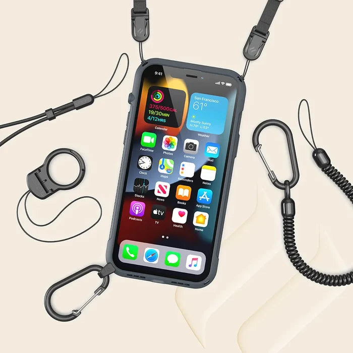 The Catalyst Case US iPhone 13 Pro - Vibe Case (MagSafe compatible) hangs from a black adjustable lanyard with clips and coiled cords. Its home screen is displayed, with detachable accessories shown nearby.
