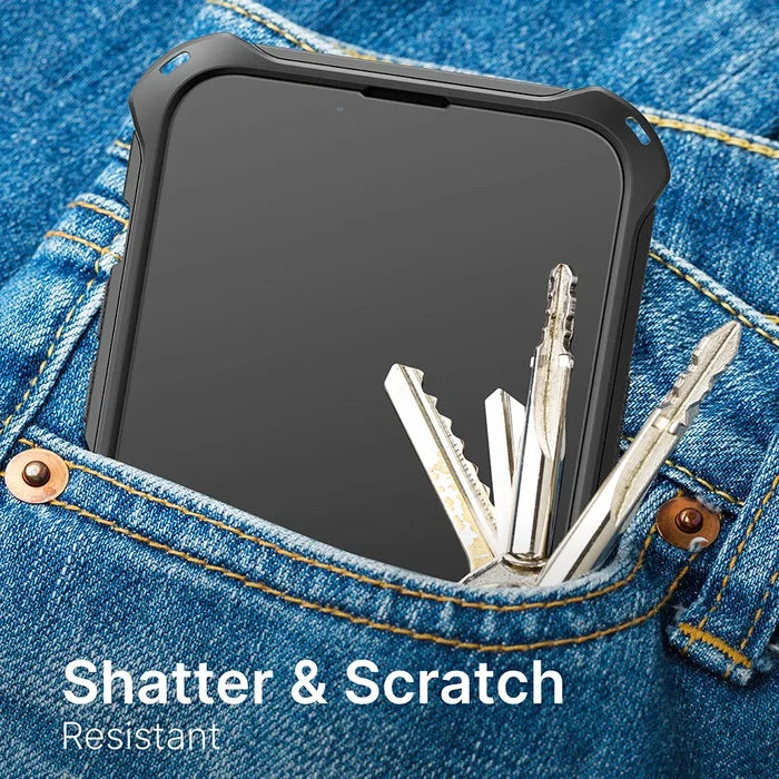 An iPhone 14 Pro Max with a black case sits in a denim pocket beside metal keys. Its flawless screen shows "Shatter & Scratch Resistant," protected by the Catalyst Case US Tempered Glass Screen Protector.