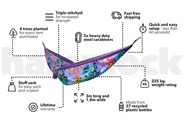 Purple and multicolored geometric patterned recycled hammock with straps, suspended in landscape position.