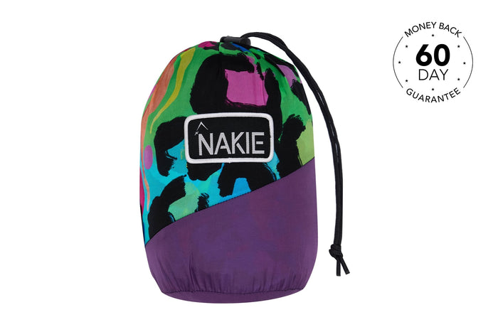 Nakie Kasey Rainbow recycled hammock with colorful abstract pattern, black straps, and purple bottom panel.