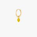 This image shows a 14k gold plated huggie with a yellow lemon charm.