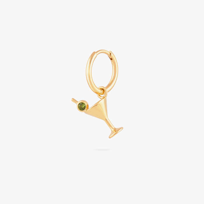 this image shows a 14k gold plated huggie with a martini glass charm with a green gemstone.