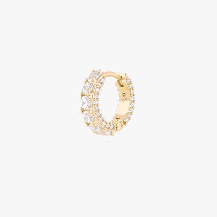 this image shows the side view of the max pave huggie with clear cz stones along the front and clear along the side of the huggie