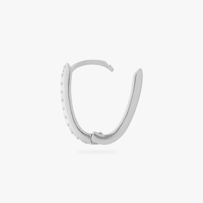 a silver medium oval hoop that has one side pave color:null|silver/clear